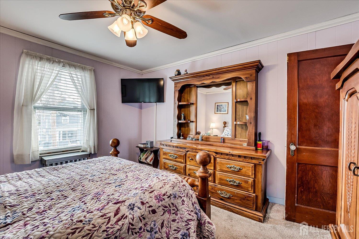 7 Clum Avenue Fords, NJ 08863 - Photo 22 of 43 a bedroom with a bed and a flat screen tv