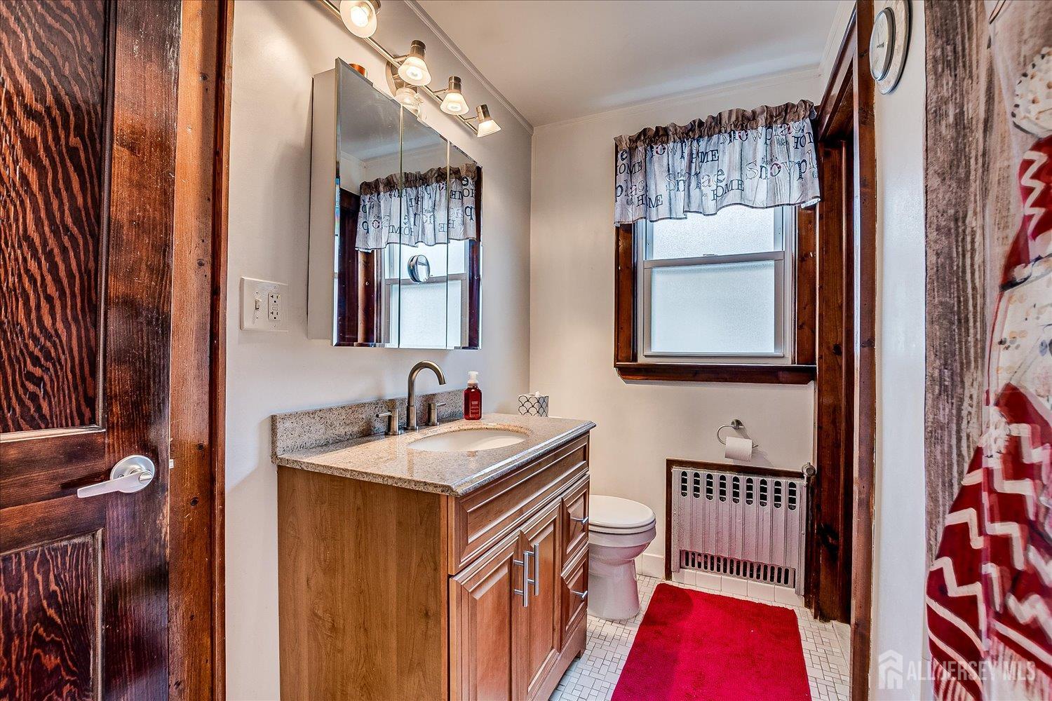 7 Clum Avenue Fords, NJ 08863 - Photo 25 of 43 a bathroom with 2 sink and a mirror