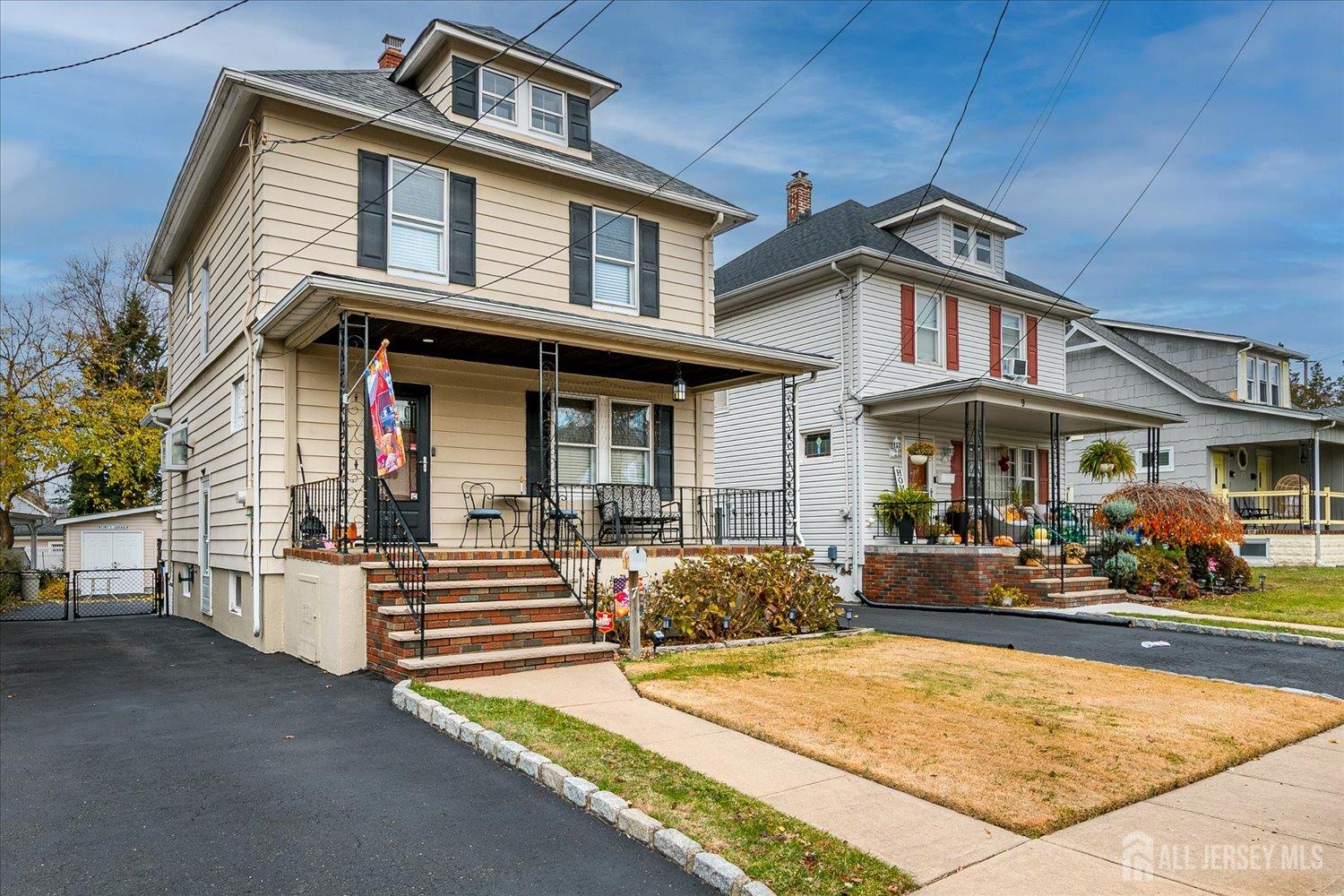 7 Clum Avenue Fords, NJ 08863 - Photo 4 of 43 a front view of a residential apartment building with a yard