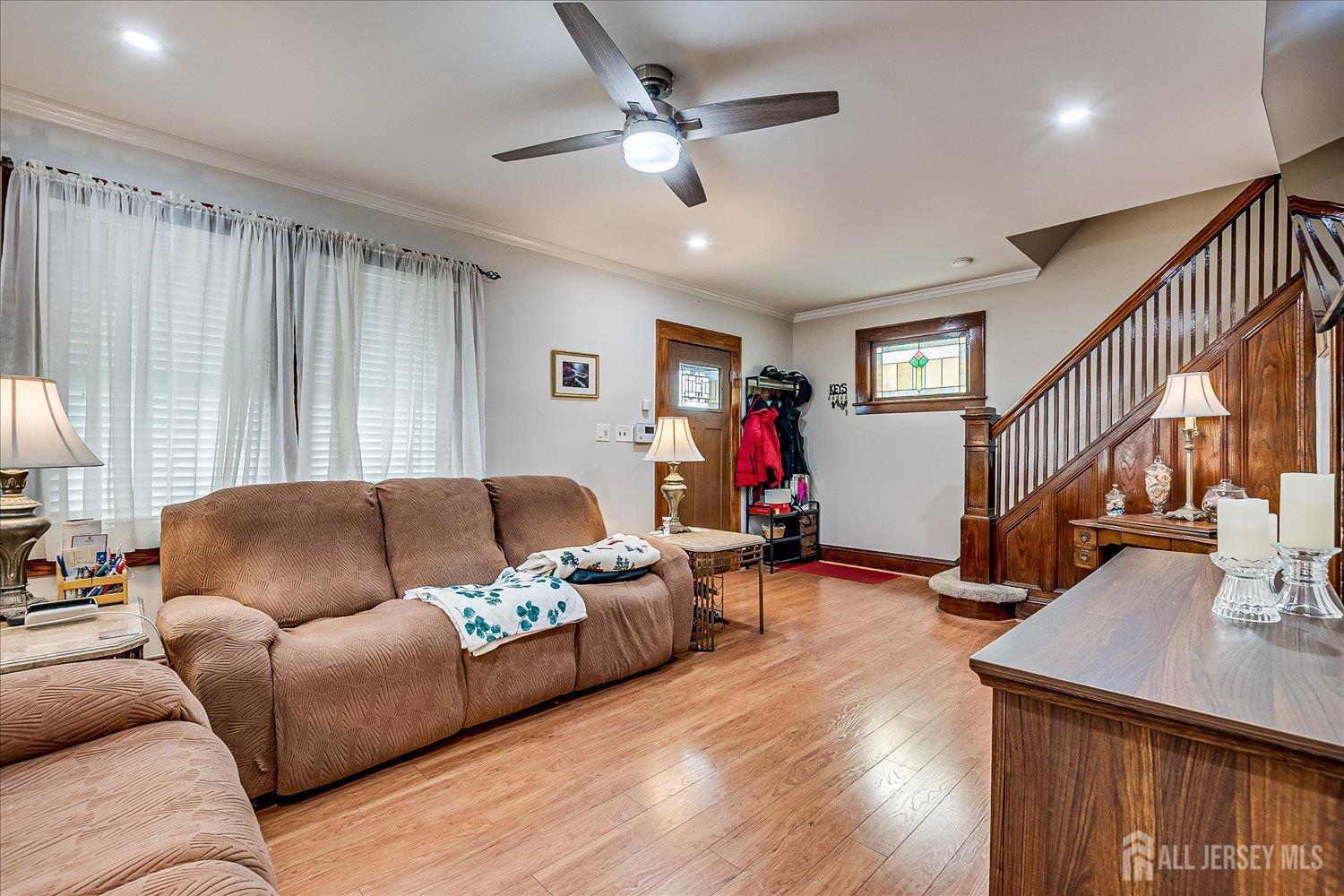 7 Clum Avenue Fords, NJ 08863 - Photo 10 of 43 a living room with furniture and a wooden floor