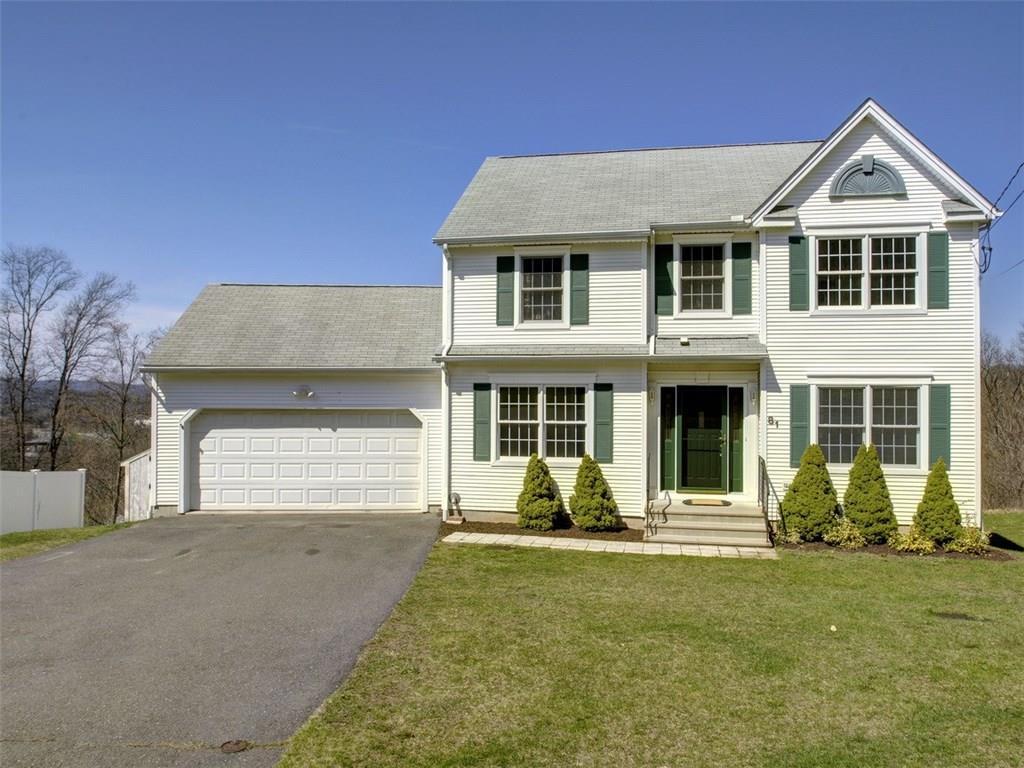 81 Maria Road Plainville, CT 06062 - Photo 1 of 1 a front view of a house with a yard and garage