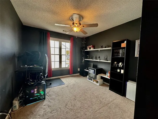 a view of a living room and a chandelier