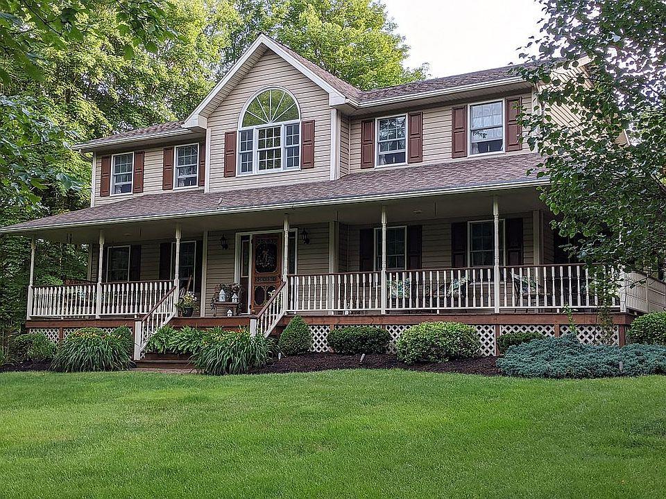 260 Meadow Road Franklin, PA 16323 - Photo 1 of 1 a front view of a house with a yard