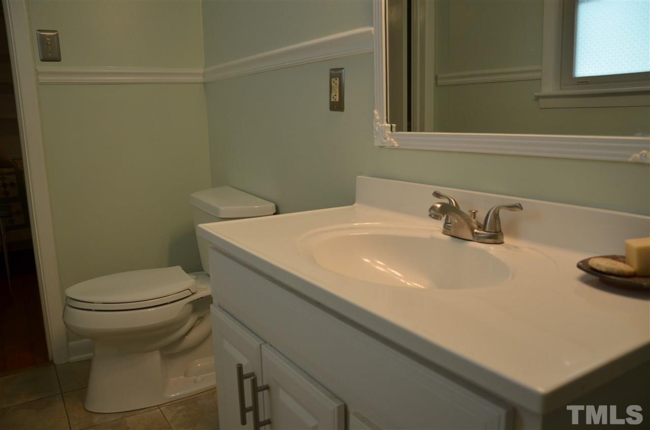 4604 Blanchard Road Durham, NC 27713 - Photo 14 of 25 a bathroom with a sink and a toilet