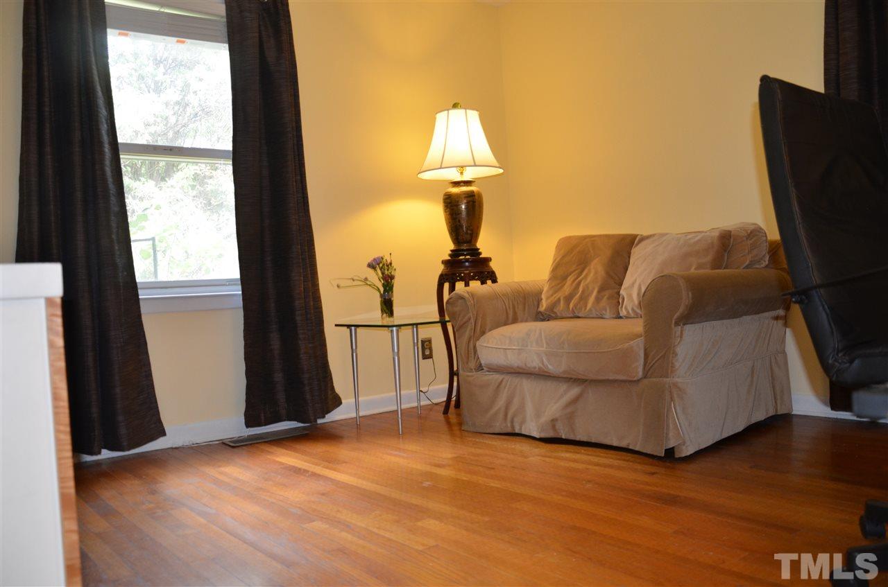 4604 Blanchard Road Durham, NC 27713 - Photo 15 of 25 a living room with furniture and a window