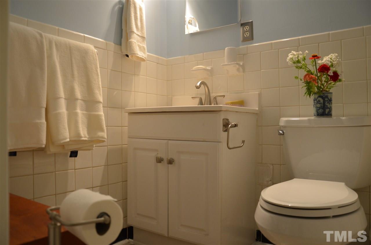 4604 Blanchard Road Durham, NC 27713 - Photo 17 of 25 a bathroom with a toilet and a shower