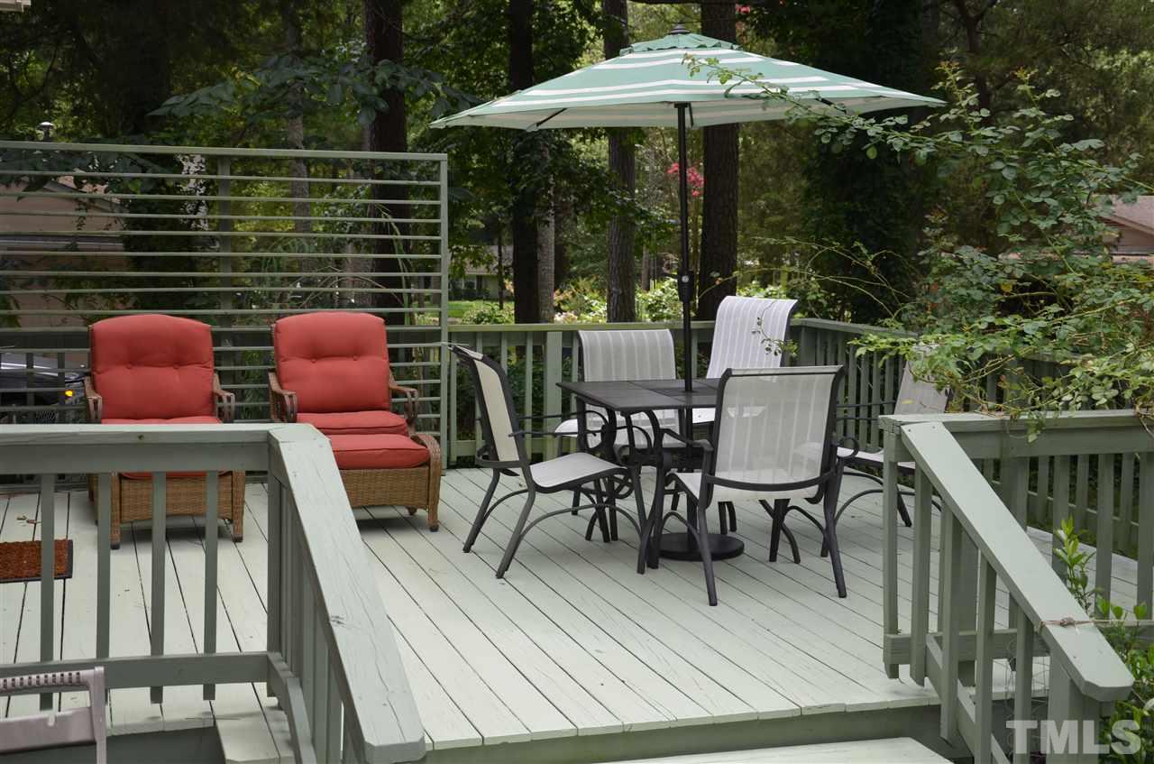 4604 Blanchard Road Durham, NC 27713 - Photo 20 of 25 a view of balcony with outdoor seating and wooden floor