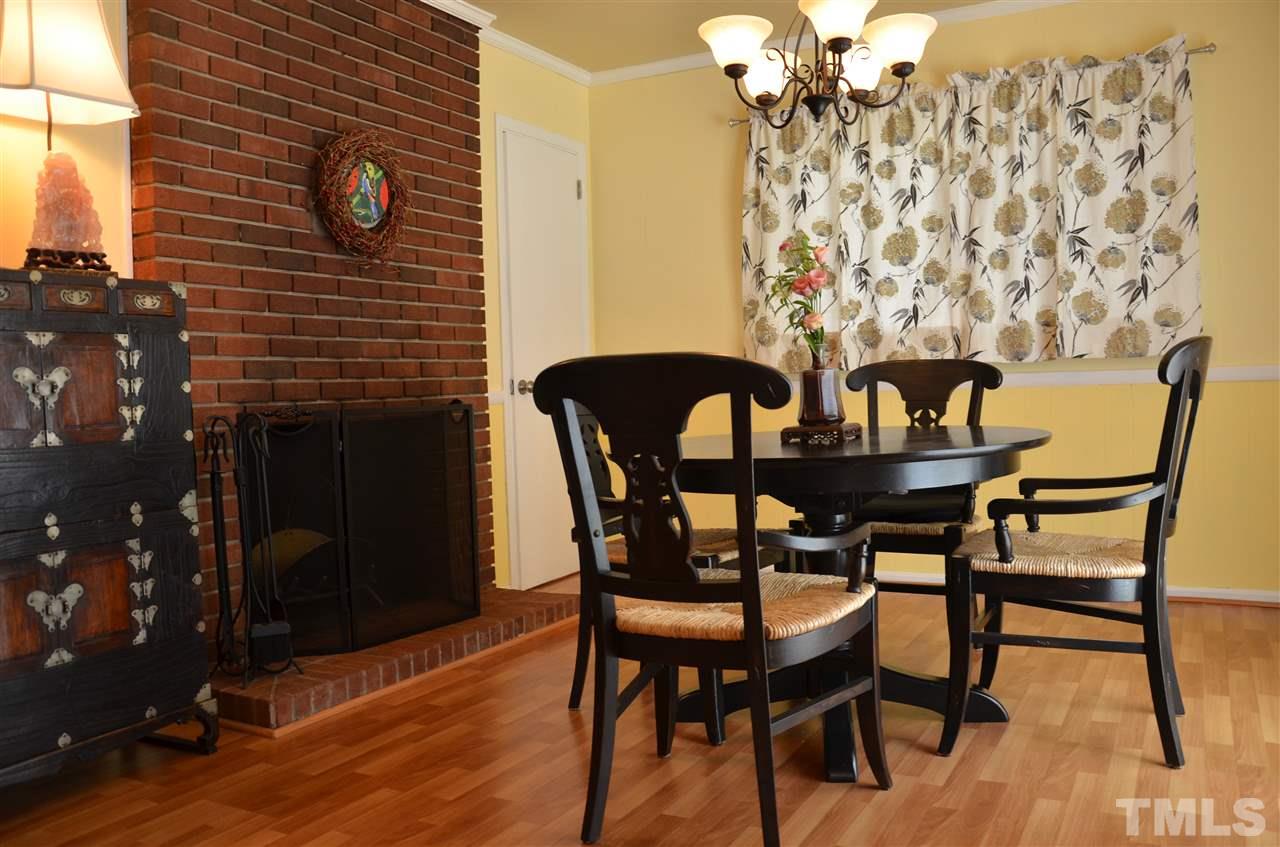 4604 Blanchard Road Durham, NC 27713 - Photo 9 of 25 a table and chairs in front of a door