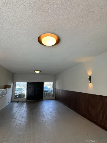 a view of a livingroom with furniture and window