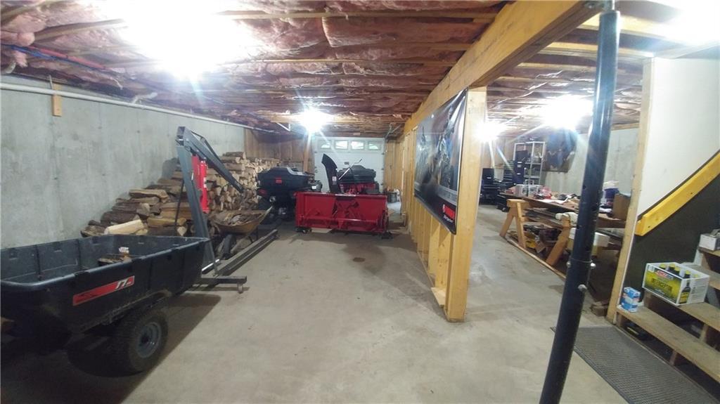 156 Garland Road Charleston, ME 04422 - Photo 33 of 34 Basement workshop and Storage