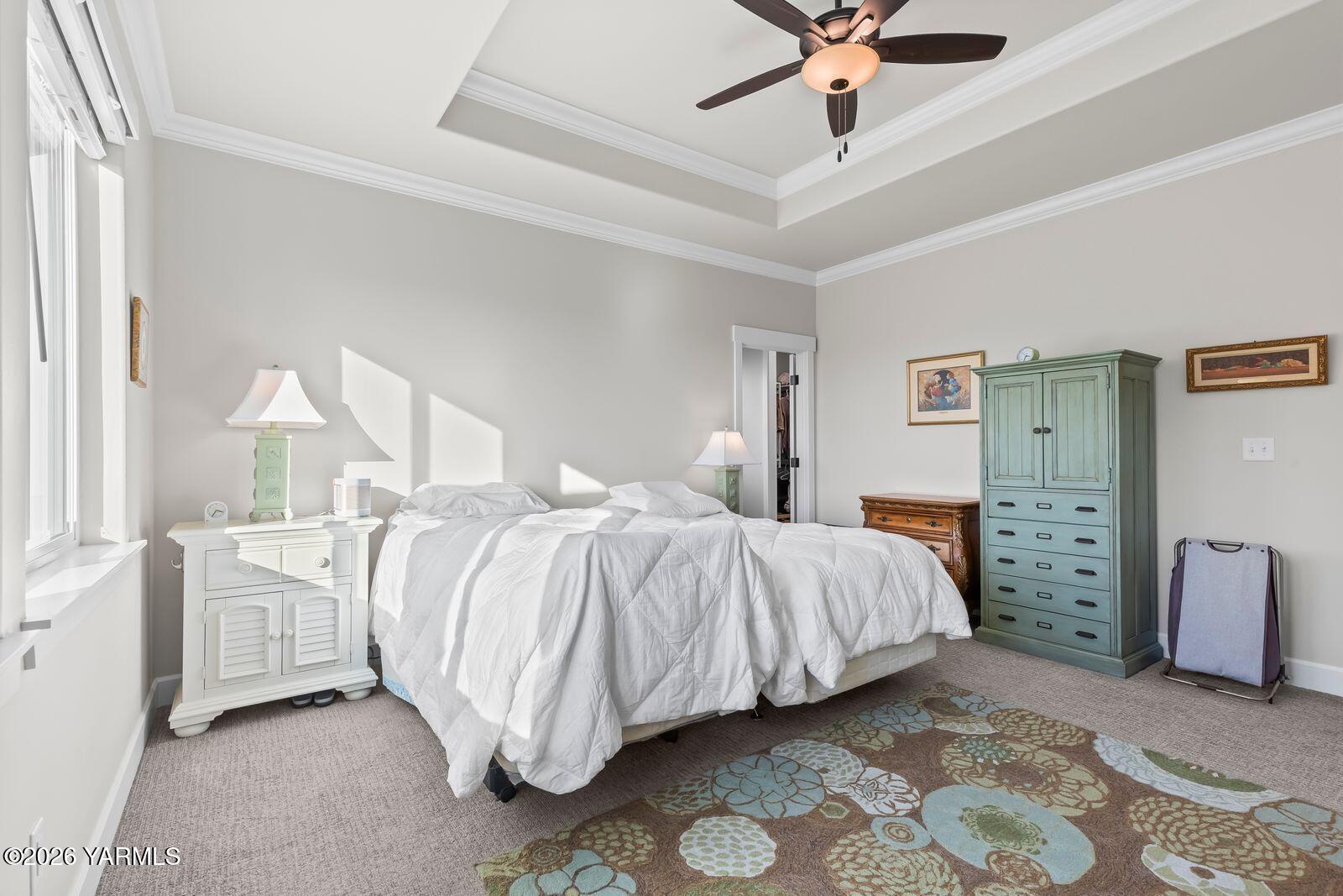 304 Rainier Street Yakima, WA 98908 - Photo 30 of 39 a bedroom with a bed and ceiling fan