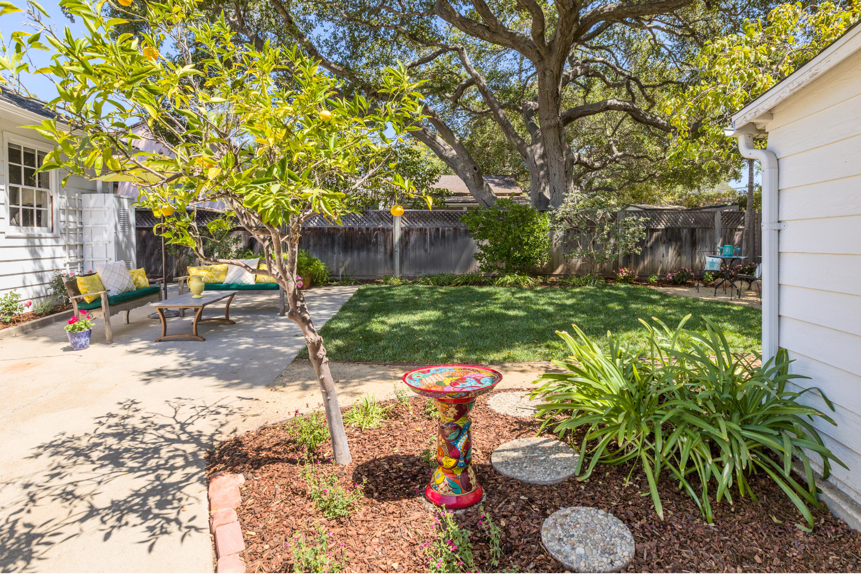 2721 Verde Vista Drive Santa Barbara, CA 93105 - Photo 14 of 21 a view of a backyard with chair and table