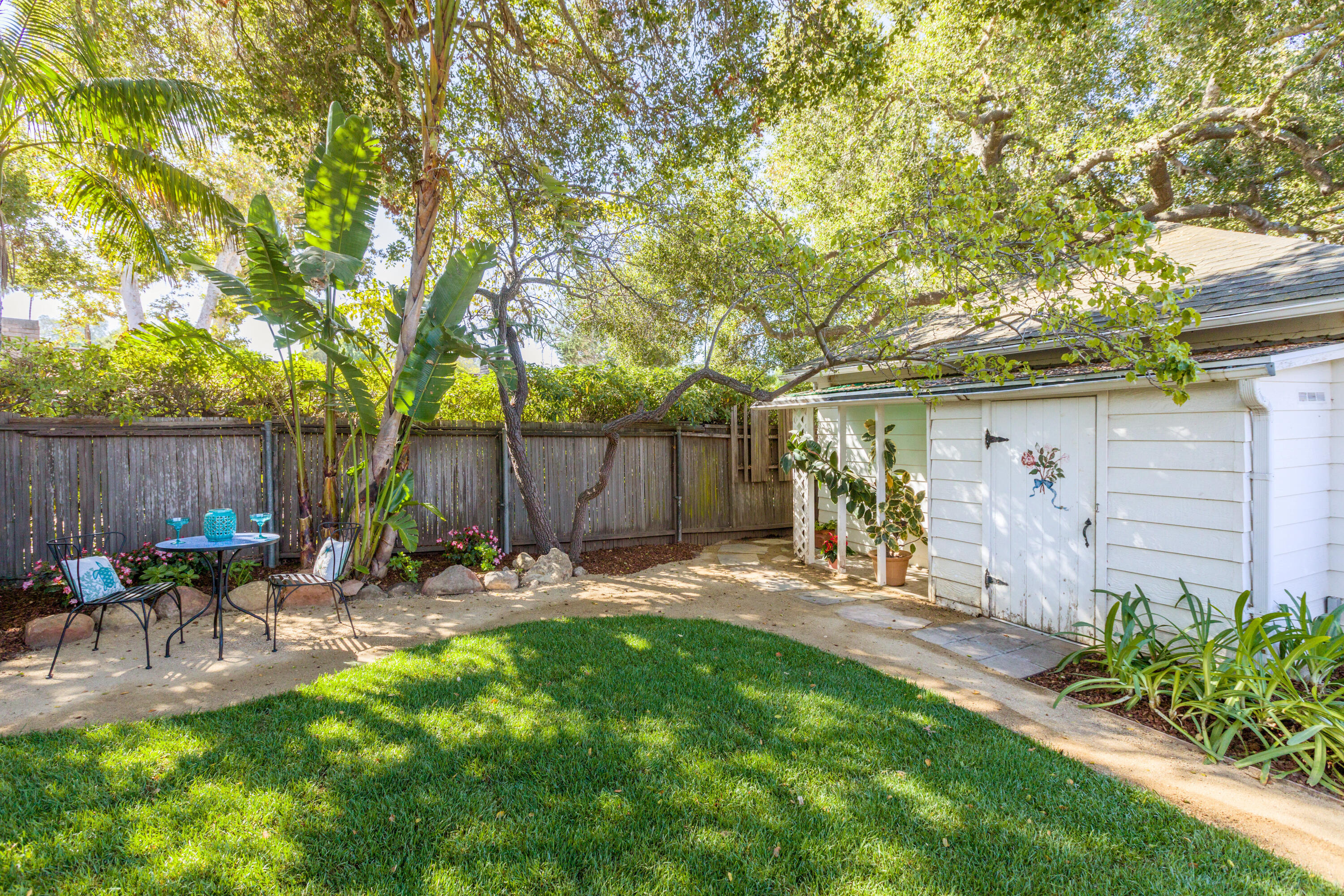 2721 Verde Vista Drive Santa Barbara, CA 93105 - Photo 15 of 21 a backyard of a house with table and chairs