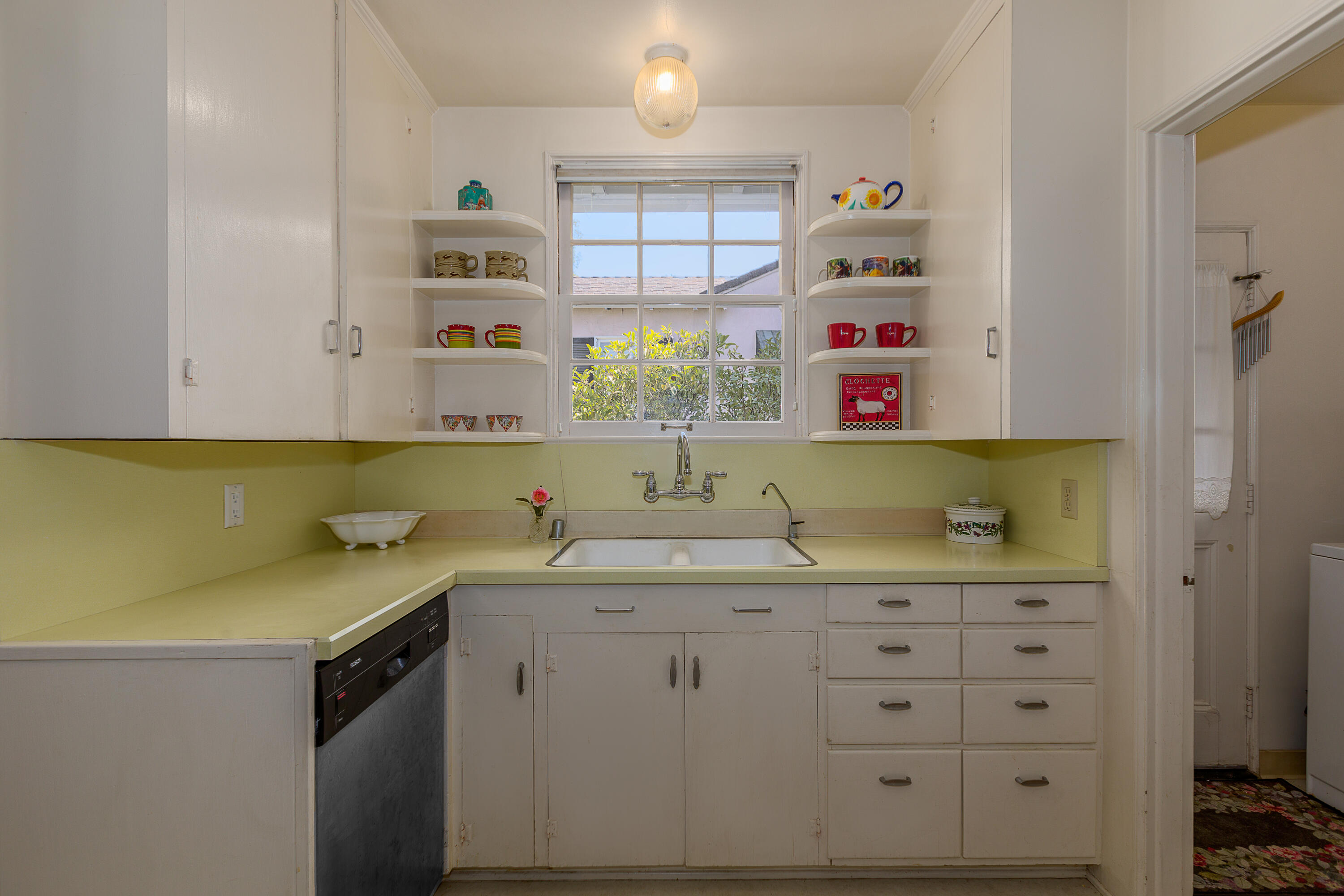 2721 Verde Vista Drive Santa Barbara, CA 93105 - Photo 6 of 21 a kitchen with a sink and cabinets