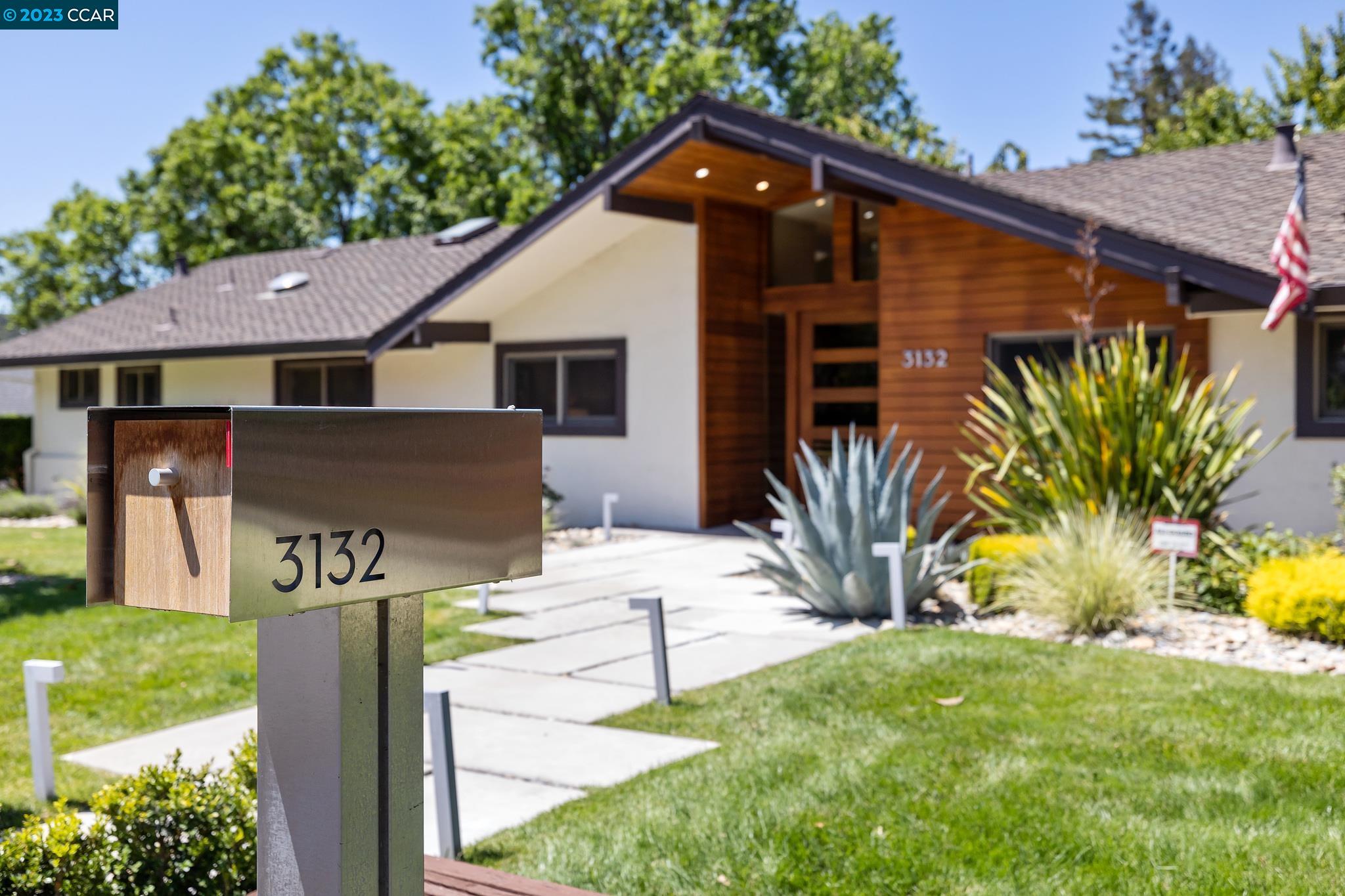 3132 Roundhill Road Alamo, CA 94507 - Photo 1 of 1 a view of a house with a yard and plants