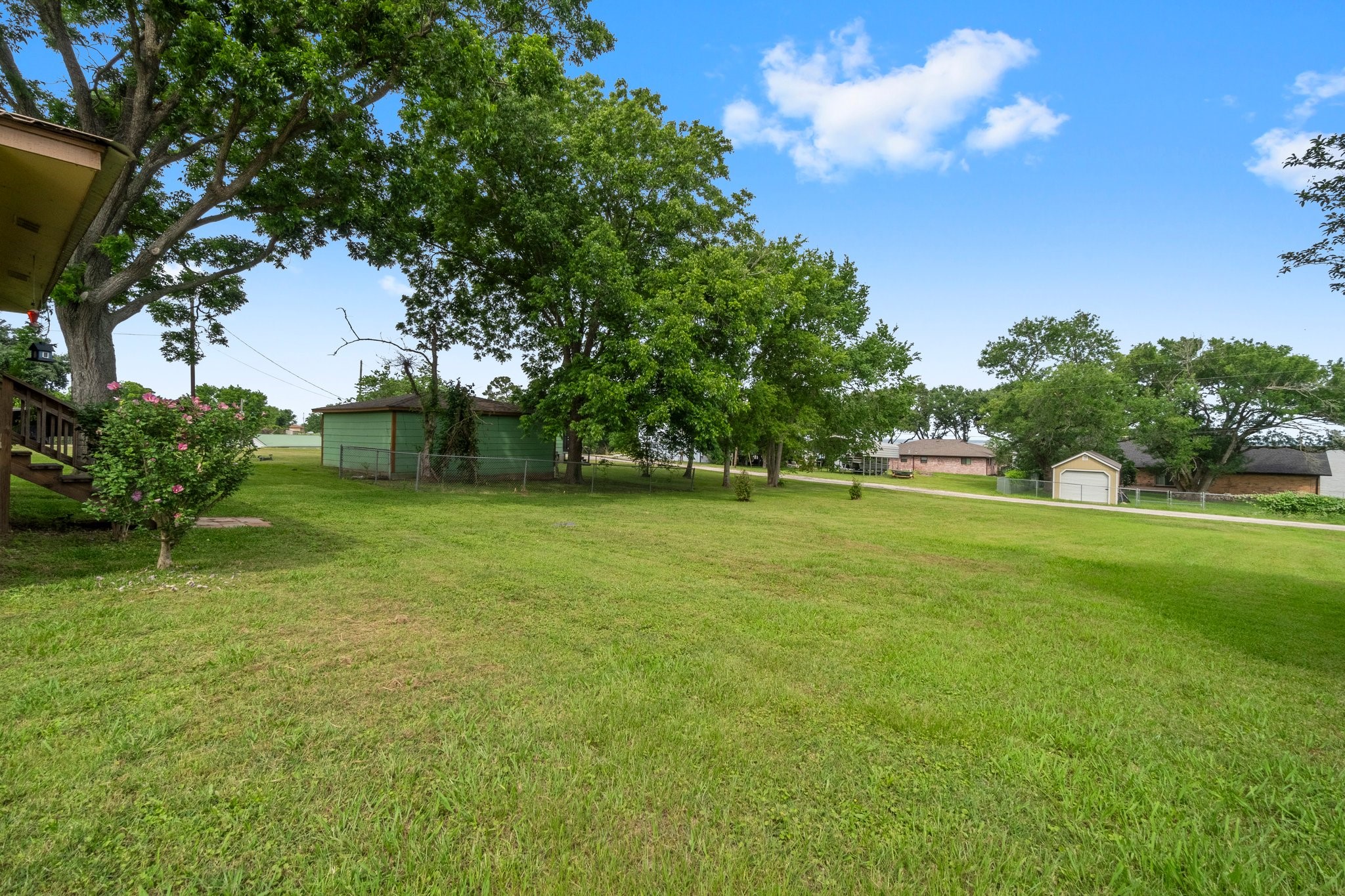 21 Clearview Point Blank, TX 77364 - Photo 7 of 43 a view of outdoor space with deck and yard