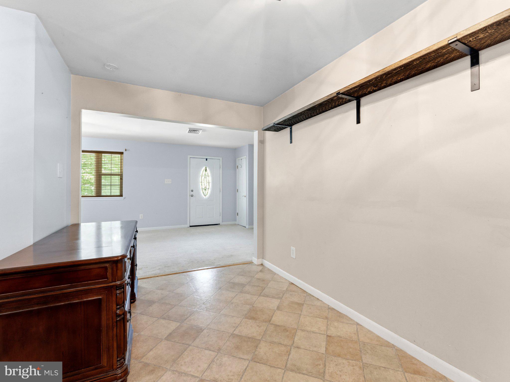 34 Supawna Road Pennsville, NJ 08070 - Photo 9 of 28 Inviting entryway with natural light.