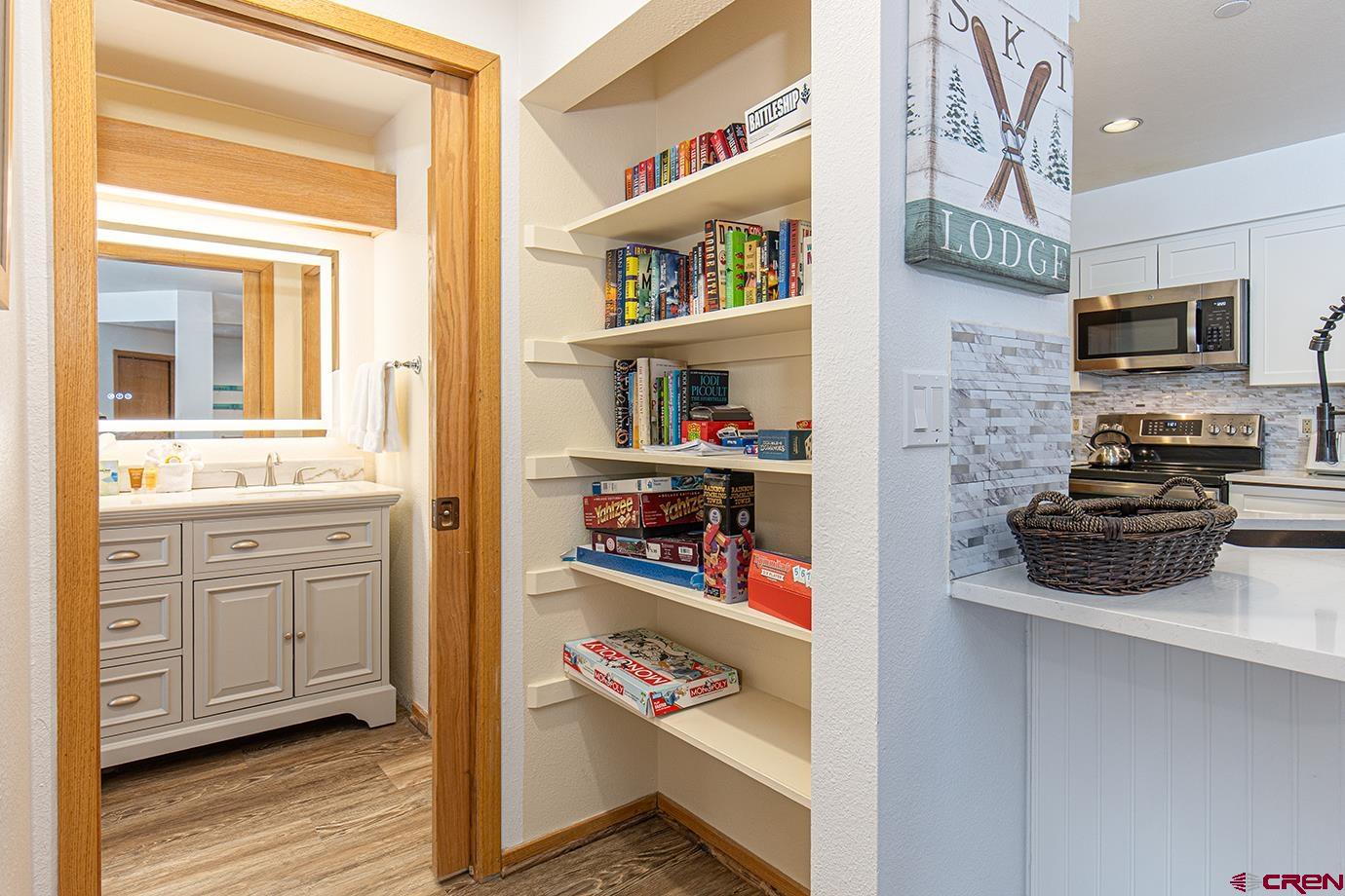 93 Needles Way, Unit 514 Durango, CO 81301 - Photo 17 of 34 a kitchen with stainless steel appliances a stove and a cabinets