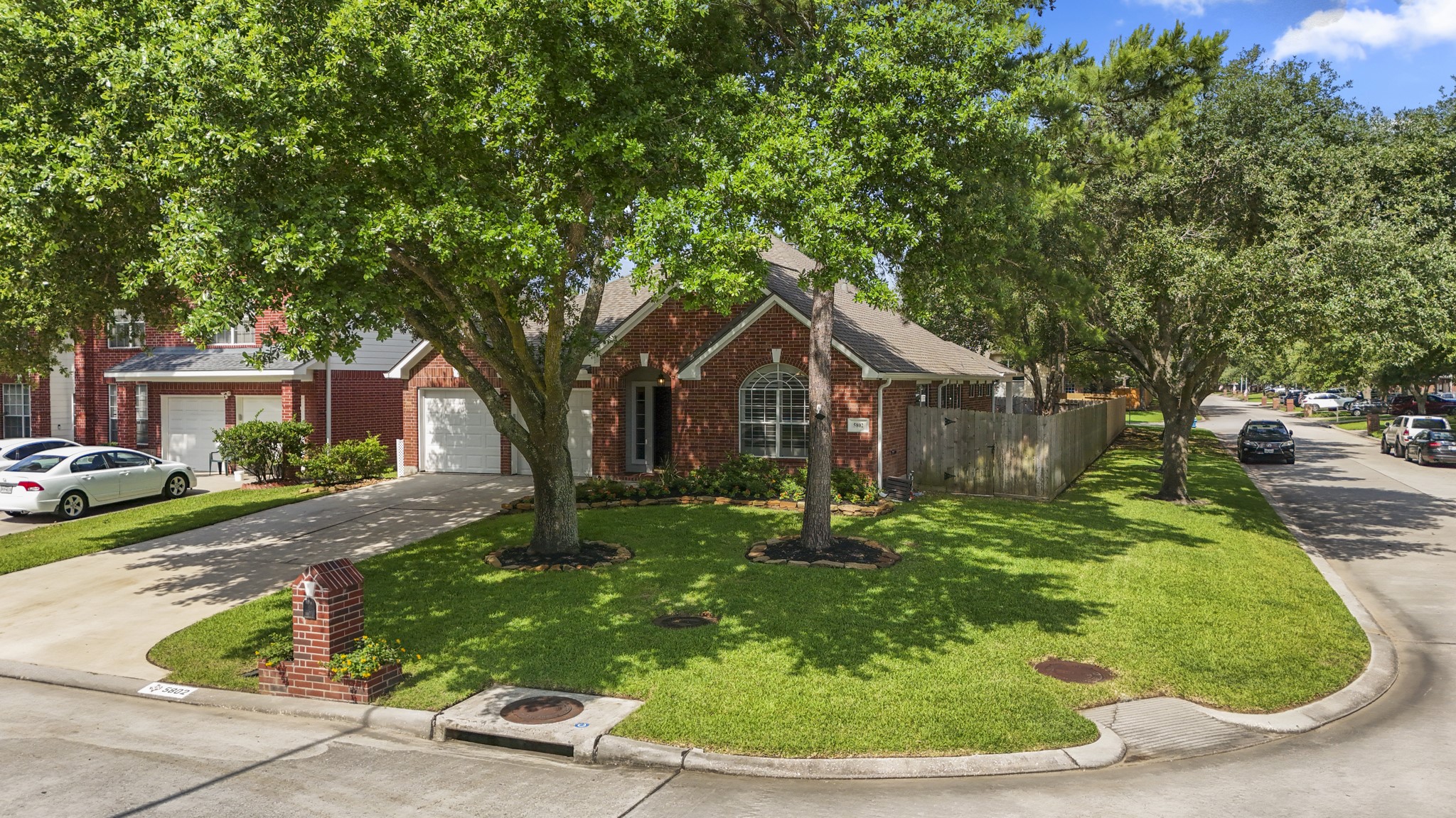 5802 Sawyer Bend Lane Spring, TX 77379 - Photo 2 of 50 a front view of a house with a yard