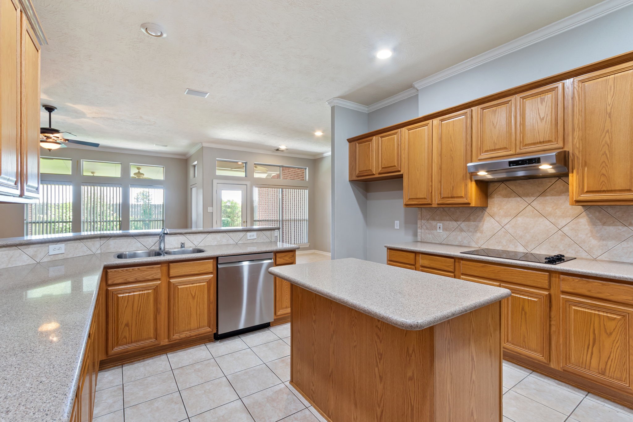 6311 Stone Trail Lane Spring, TX 77379 - Photo 14 of 47 Gorgeous granite island kitchen with Stainless steel appliances and counterspace galore!
