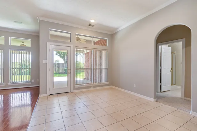 a view of an empty room and window