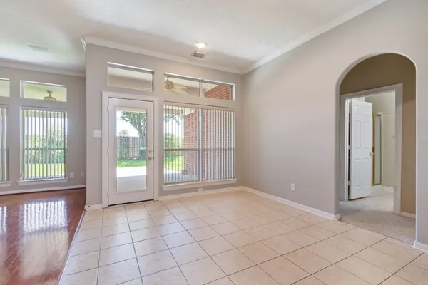 a view of an empty room and window