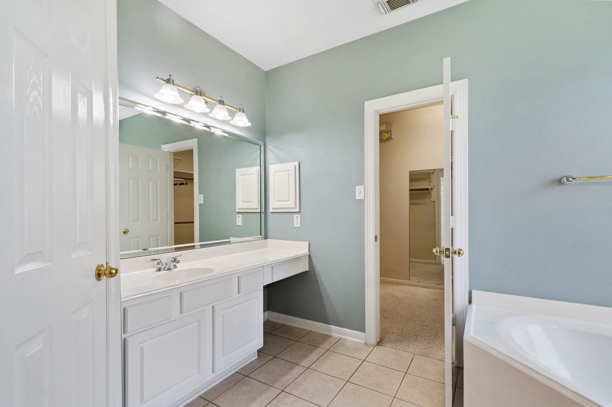 6311 Stone Trail Lane Spring, TX 77379 - Photo 25 of 47 Sink #1 with a built-in vanity and extra storage space for your nightly skin care routine!