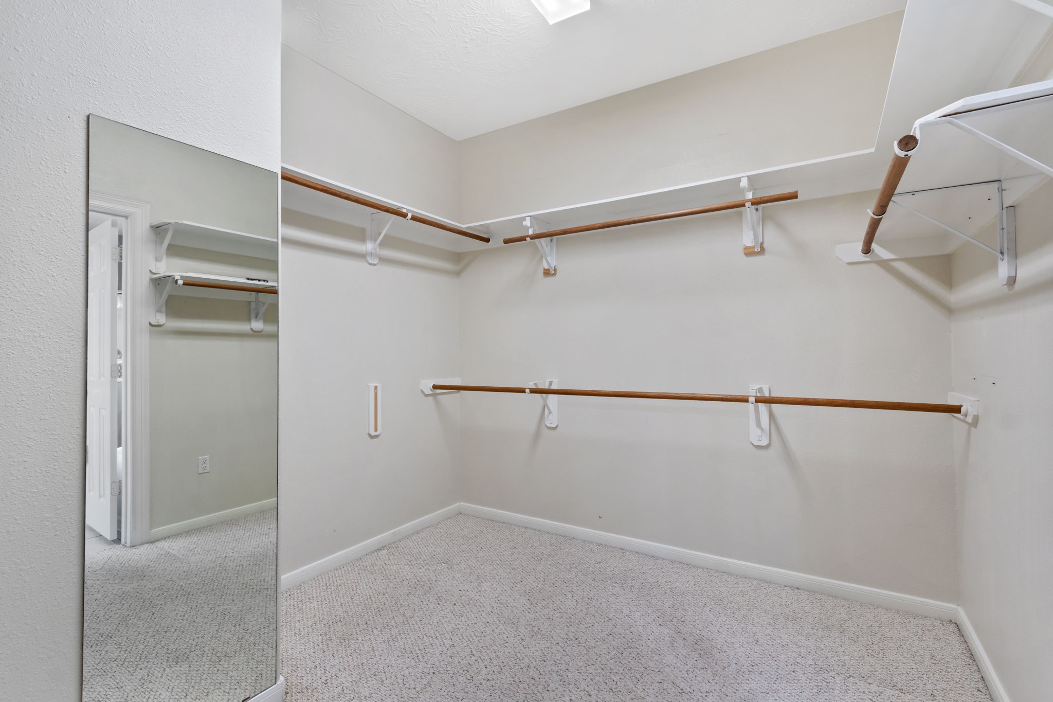 6311 Stone Trail Lane Spring, TX 77379 - Photo 27 of 47 Large walk-in closet and dressing mirror to make sure you are ready for the day