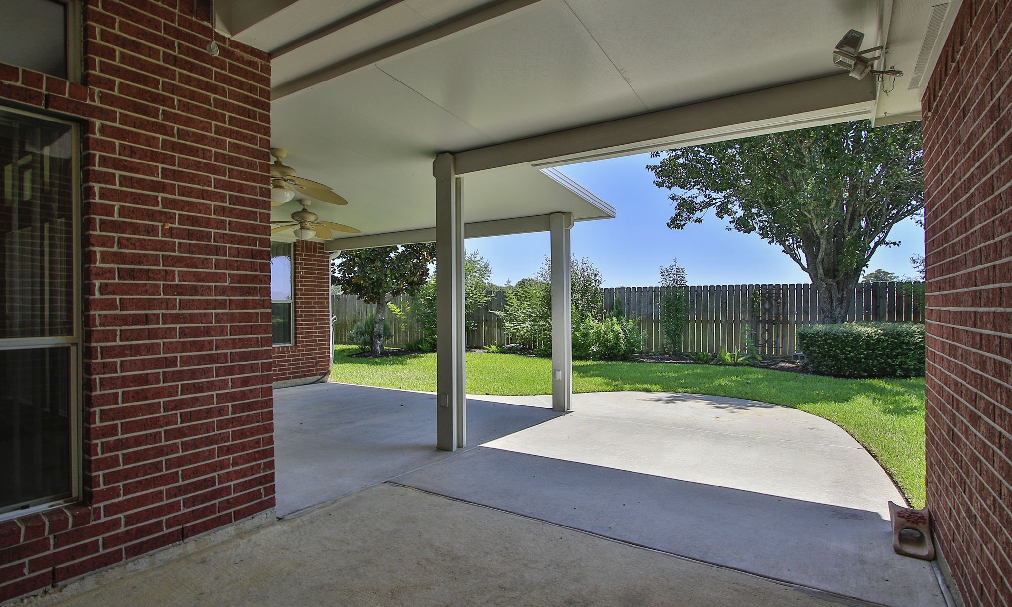 6311 Stone Trail Lane Spring, TX 77379 - Photo 31 of 47 Incredible covered outdoor space with space for multiple seating areas!