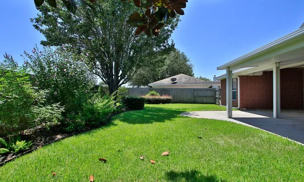 a view of an house with outdoor space and seating area