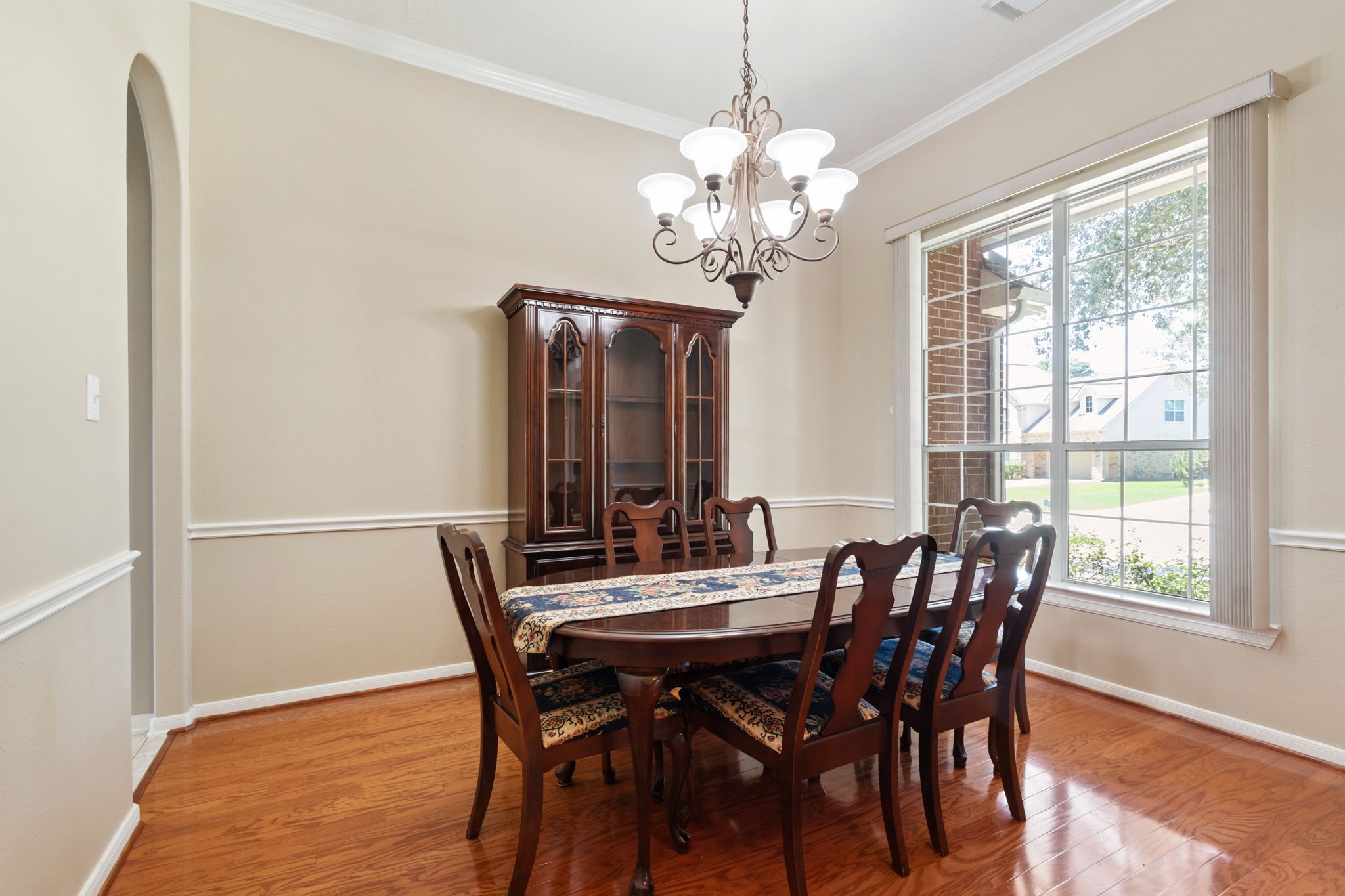 6311 Stone Trail Lane Spring, TX 77379 - Photo 9 of 47 Just off the foyer is the formal dining room boasting chair rail and crown molding