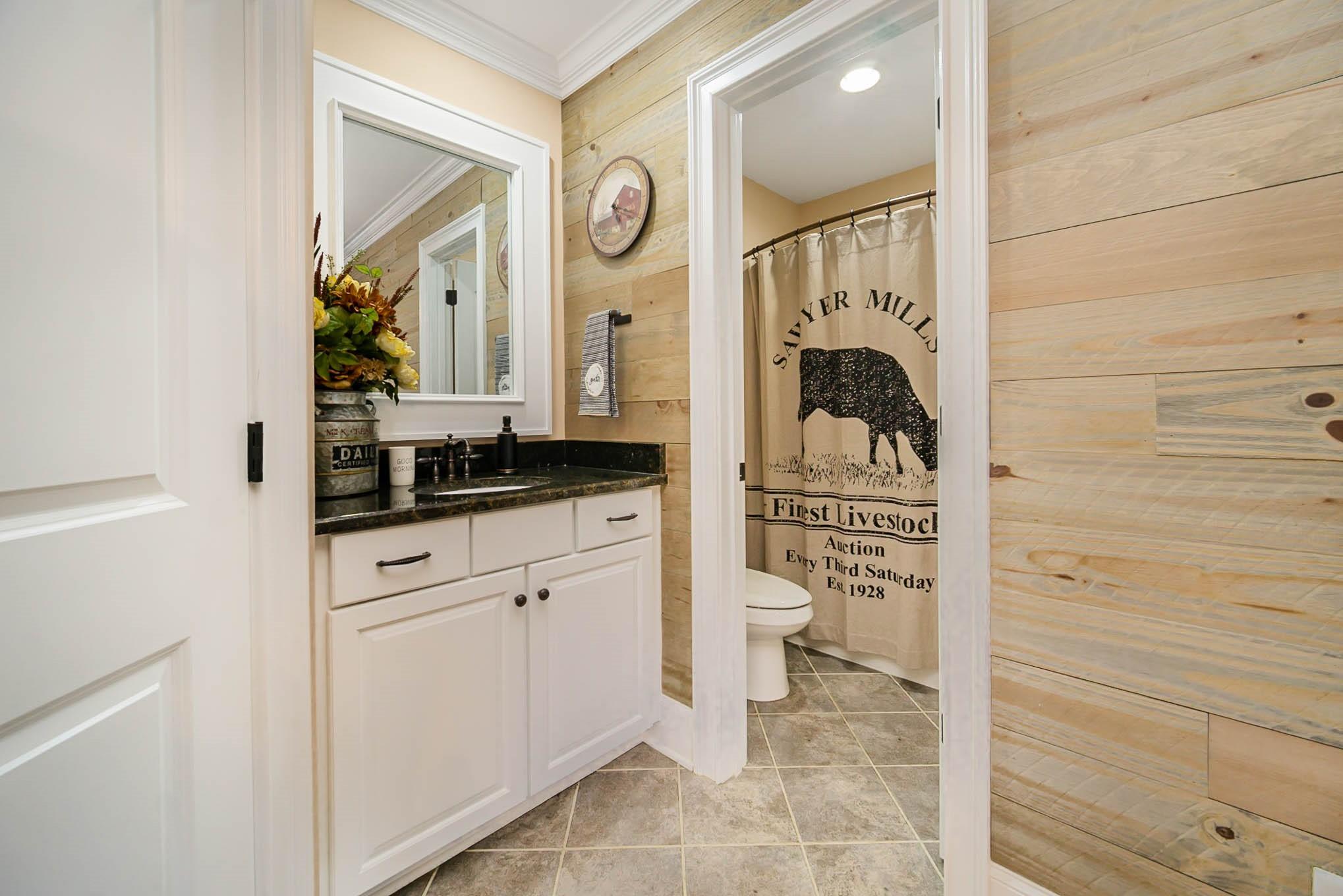 6700 Fox Ridge Circle Davidson, NC 28036 - Photo 33 of 48 a bathroom with a bathtub and a sink