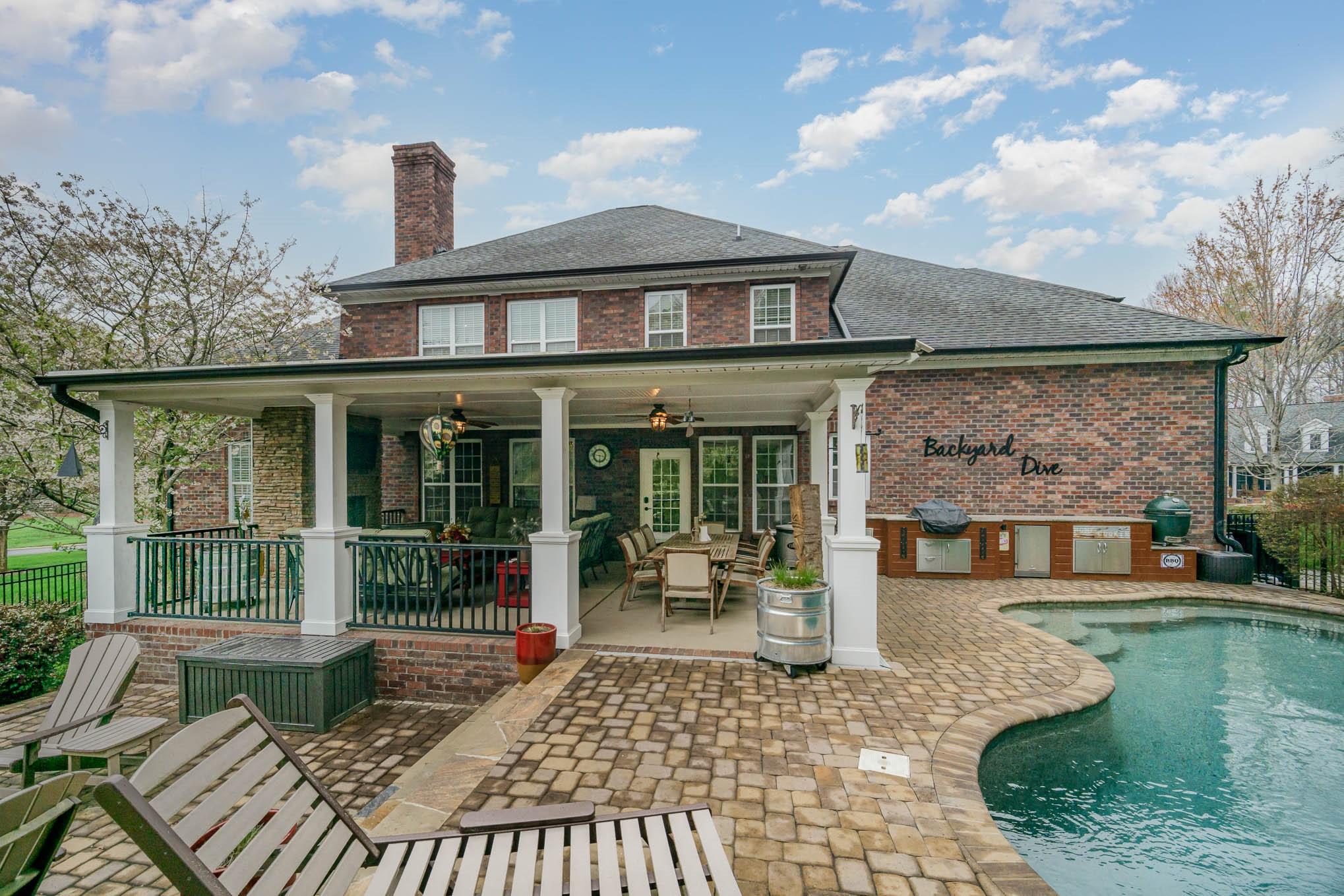 6700 Fox Ridge Circle Davidson, NC 28036 - Photo 40 of 48 a view of a house with sitting area and garden