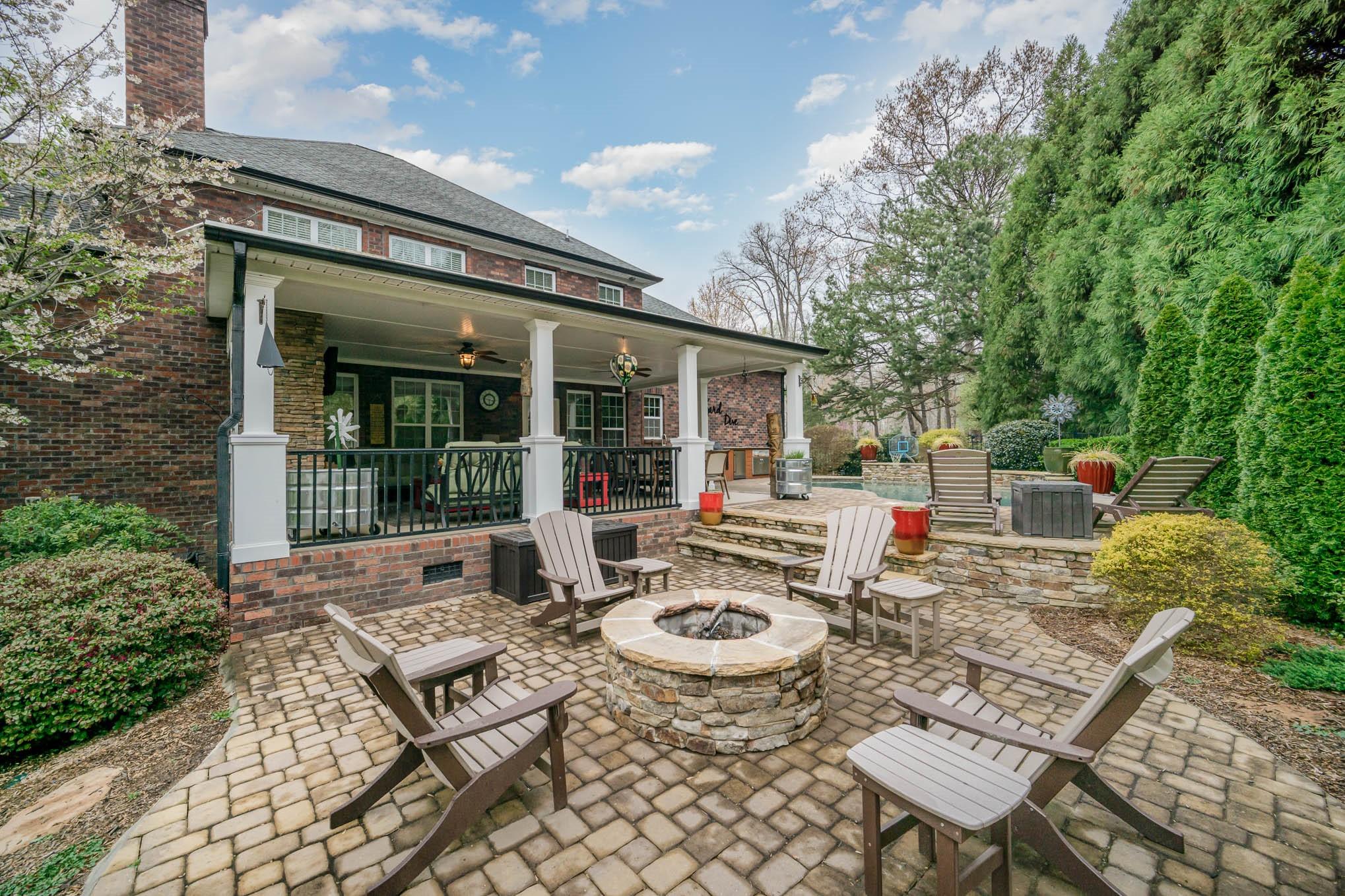6700 Fox Ridge Circle Davidson, NC 28036 - Photo 41 of 48 a view of house with backyard outdoor seating and green space
