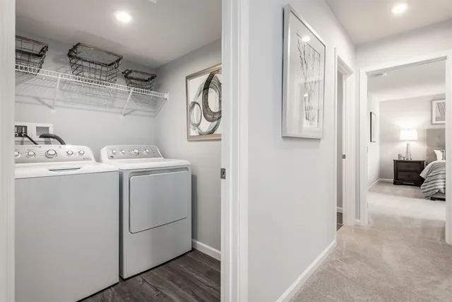 a utility room with dryer and washer