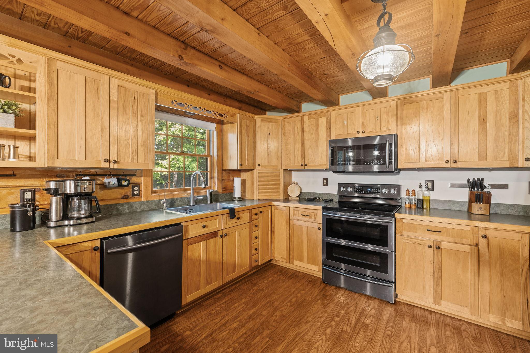 4344 Mission Road Harpers Ferry, WV 25425 - Photo 19 of 60 Warm wooden kitchen with modern appliances.