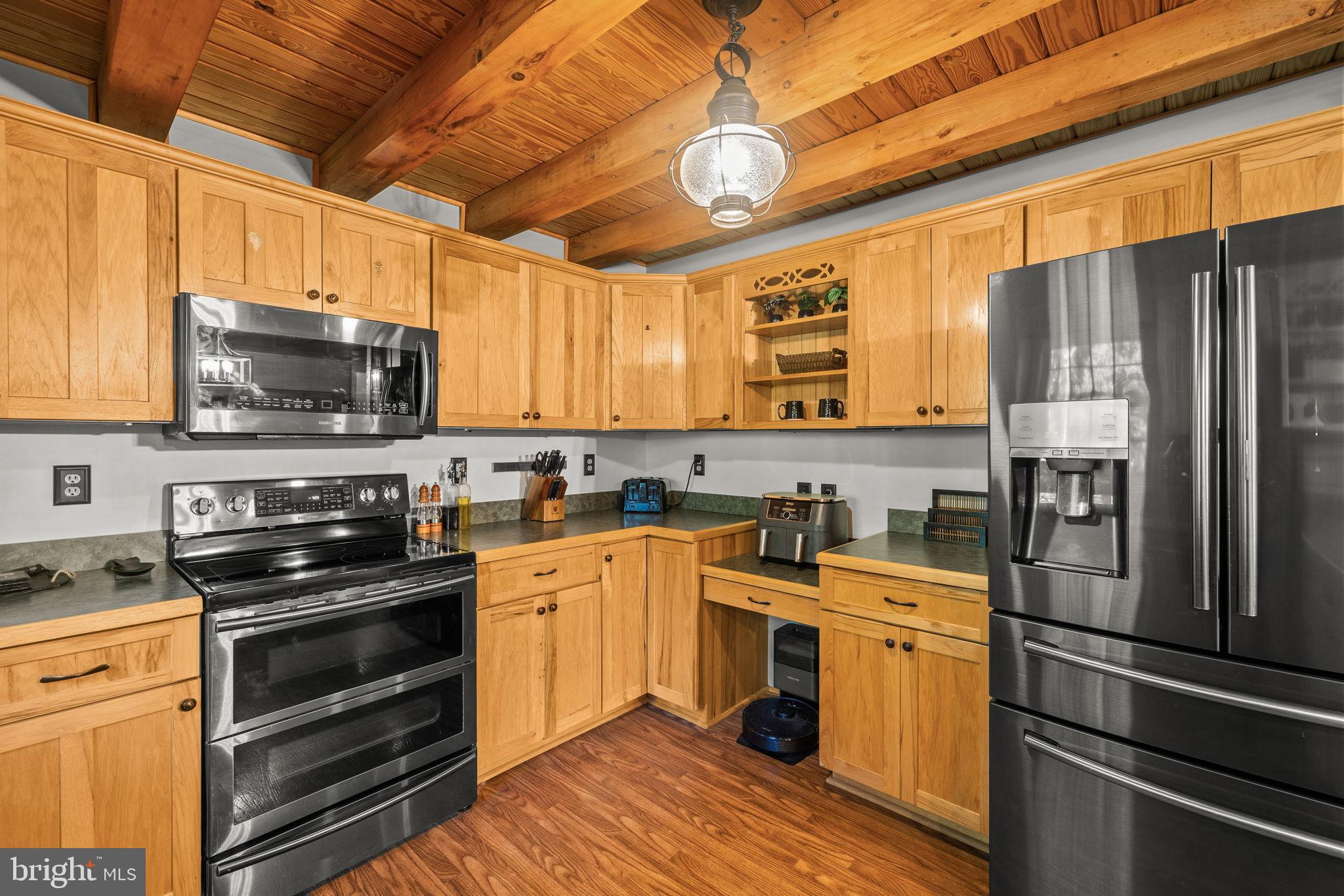 4344 Mission Road Harpers Ferry, WV 25425 - Photo 20 of 60 Charming kitchen with rustic wooden beams.