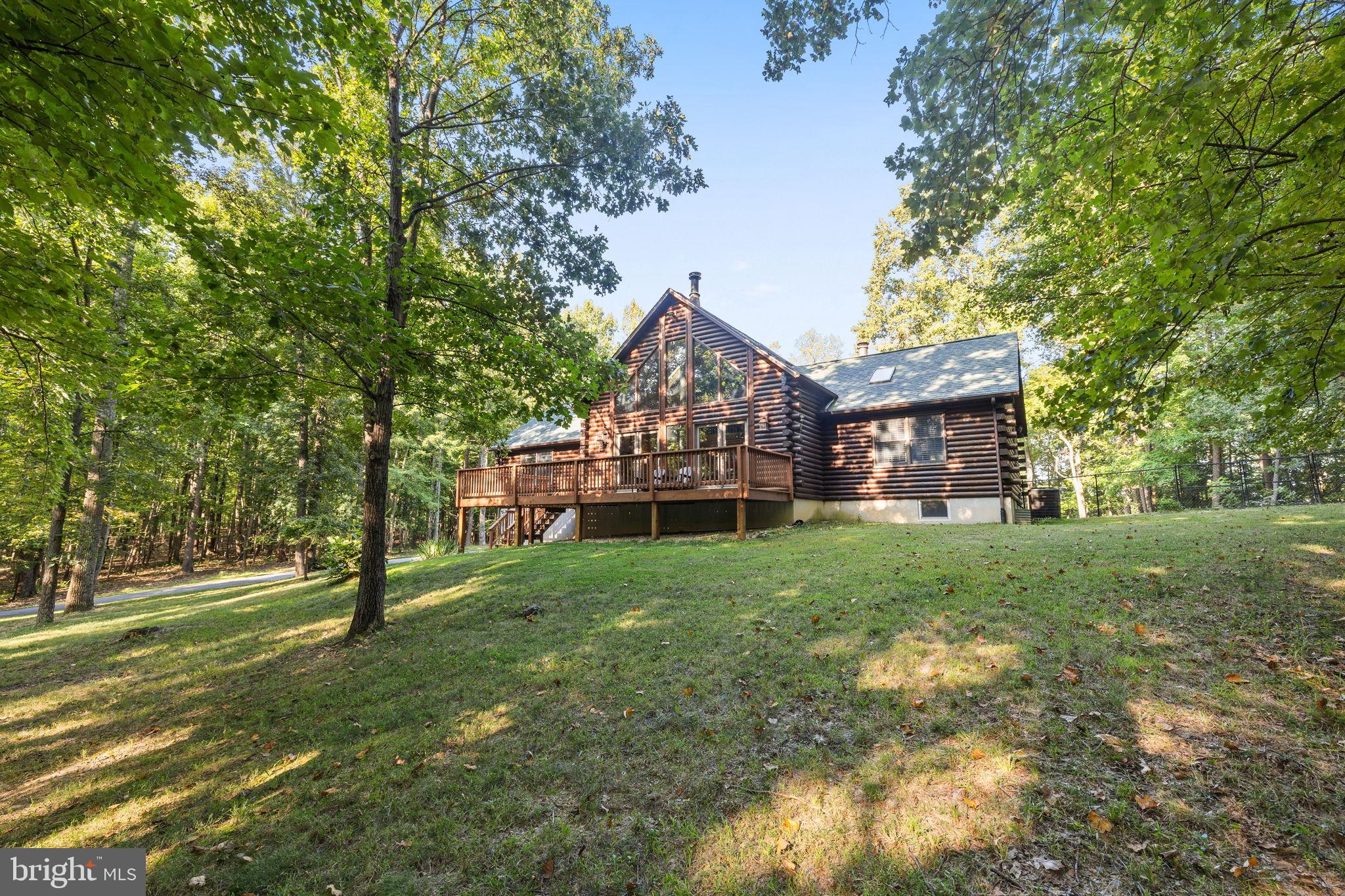 4344 Mission Road Harpers Ferry, WV 25425 - Photo 2 of 60 Charming log cabin nestled in serene woods.
