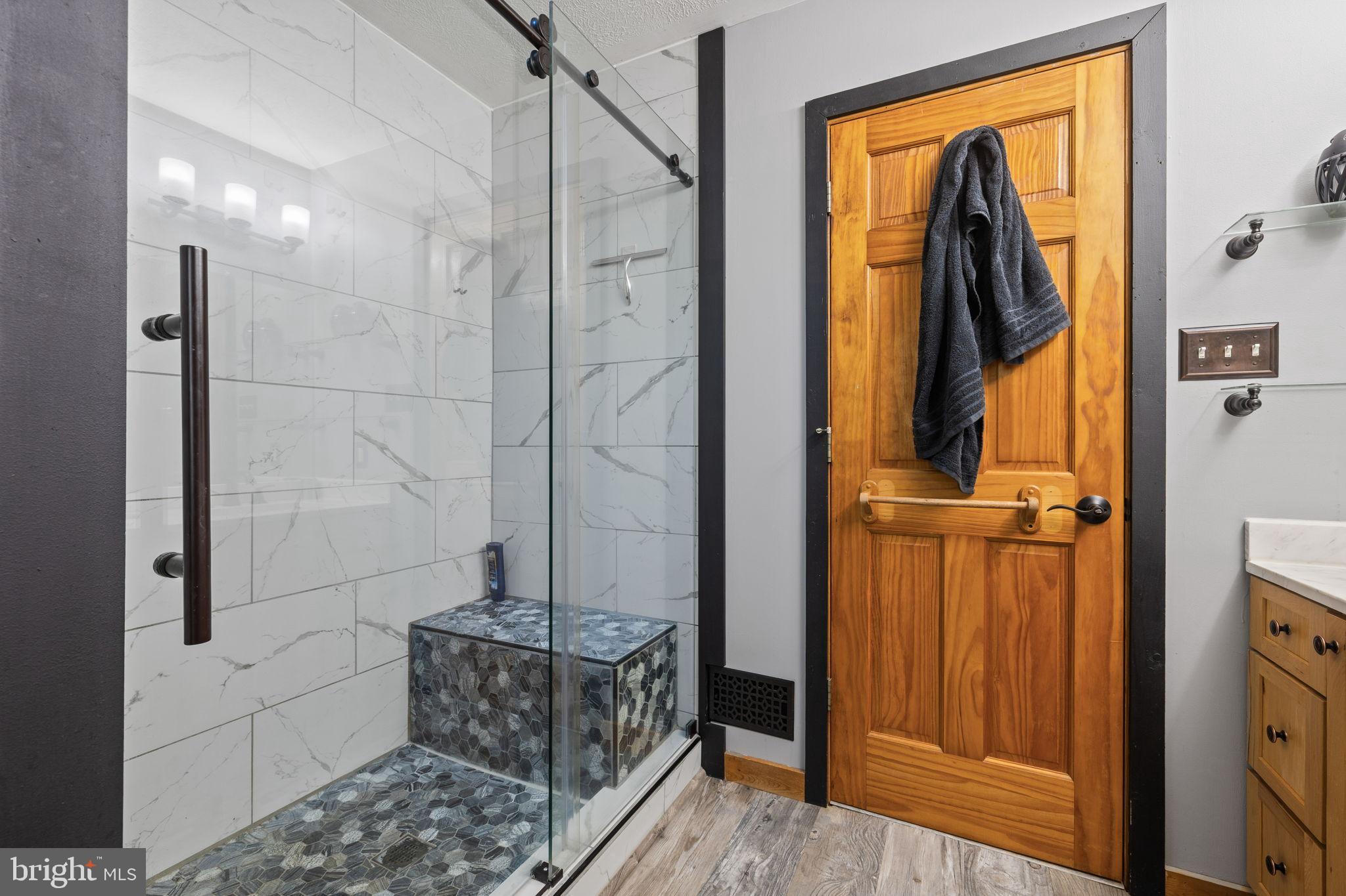 4344 Mission Road Harpers Ferry, WV 25425 - Photo 26 of 60 Sleek modern bathroom with elegant finishes.