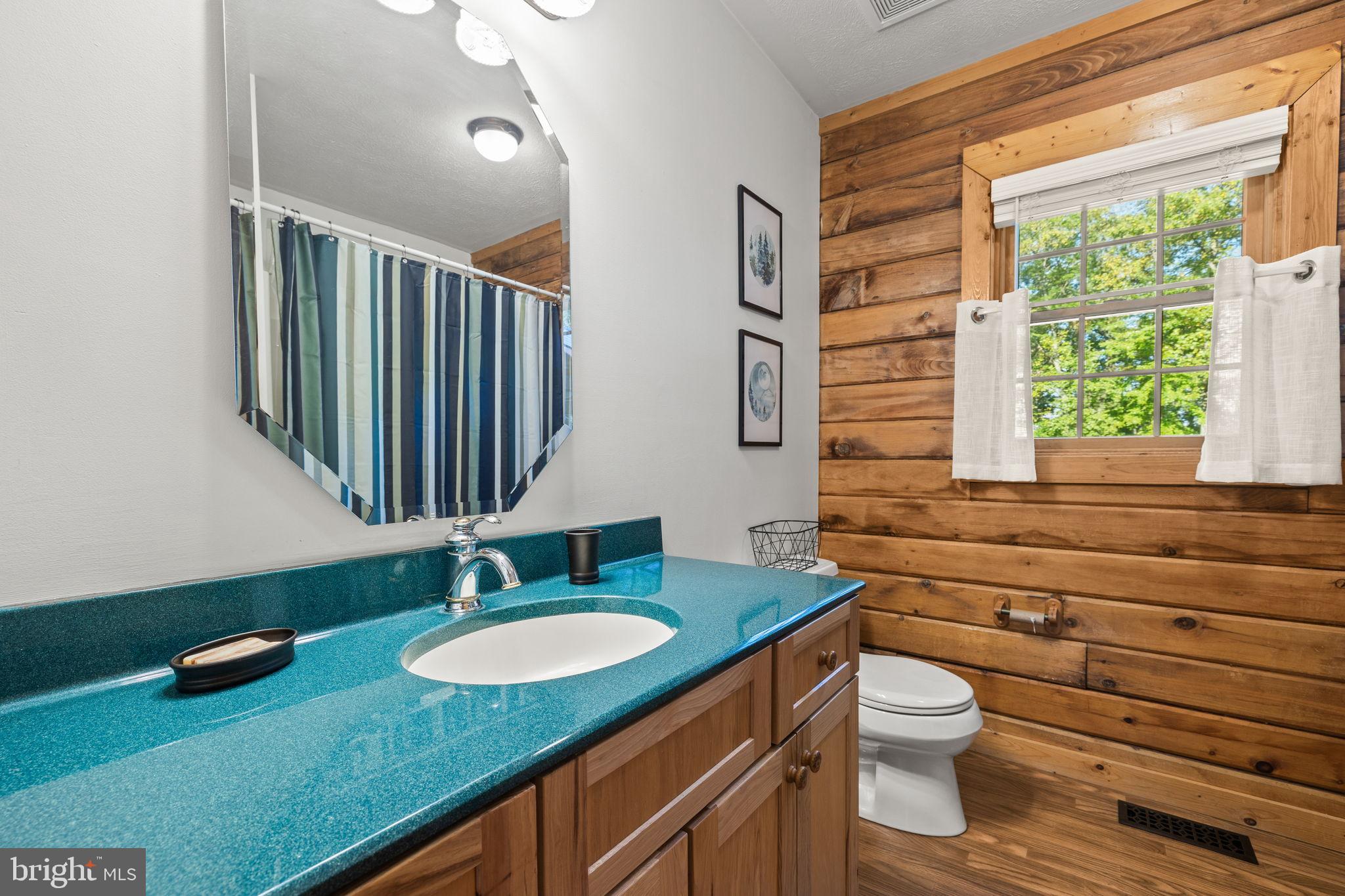 4344 Mission Road Harpers Ferry, WV 25425 - Photo 29 of 60 Charming bathroom with rustic wood accents.