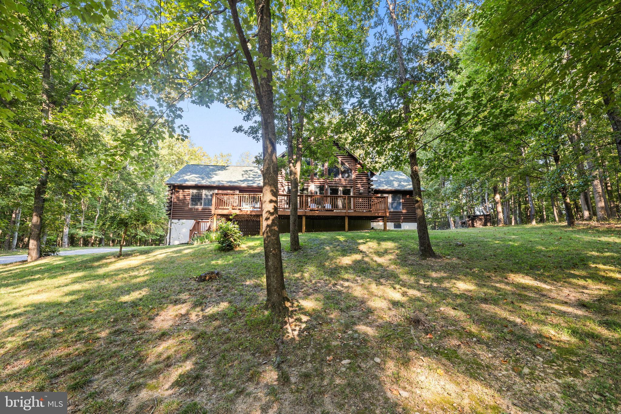 4344 Mission Road Harpers Ferry, WV 25425 - Photo 3 of 60 Charming cabin nestled among lush trees.