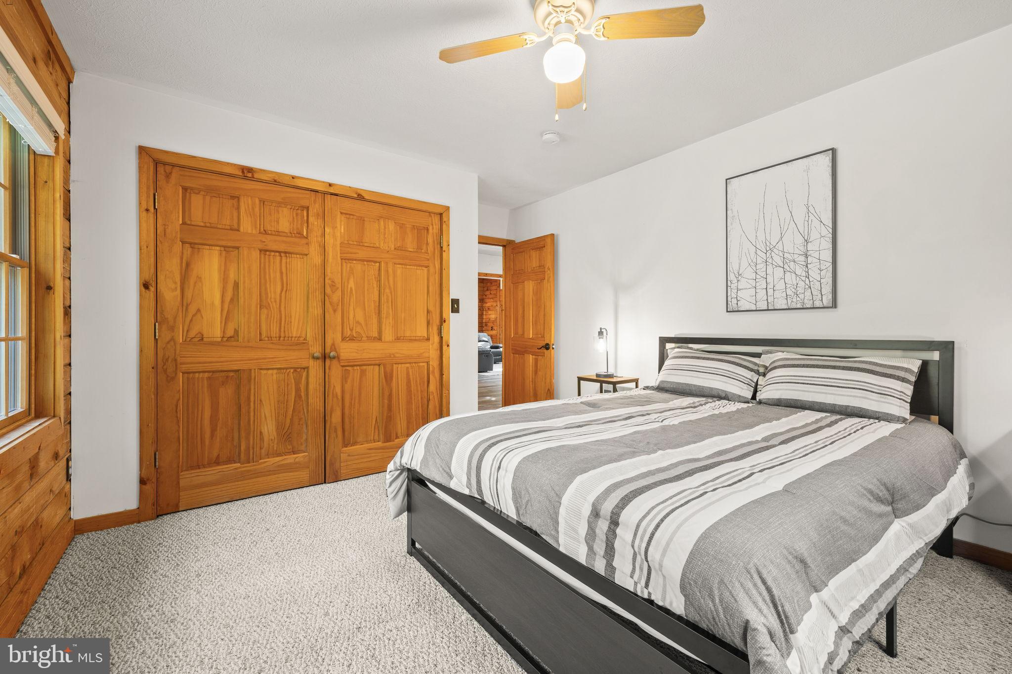 4344 Mission Road Harpers Ferry, WV 25425 - Photo 31 of 60 Cozy bedroom with warm wooden accents.