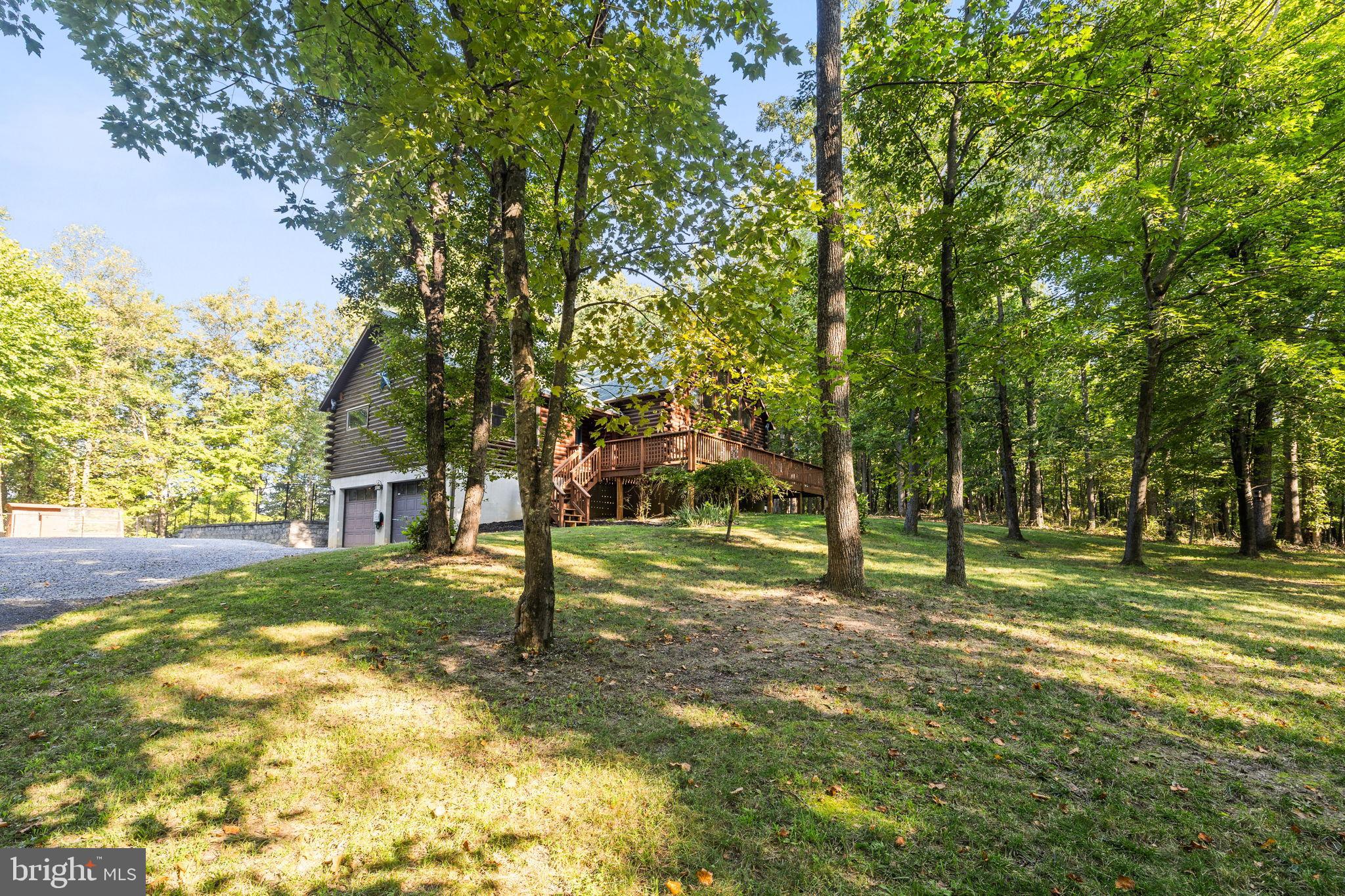 4344 Mission Road Harpers Ferry, WV 25425 - Photo 10 of 60 Serene home nestled among lush trees.