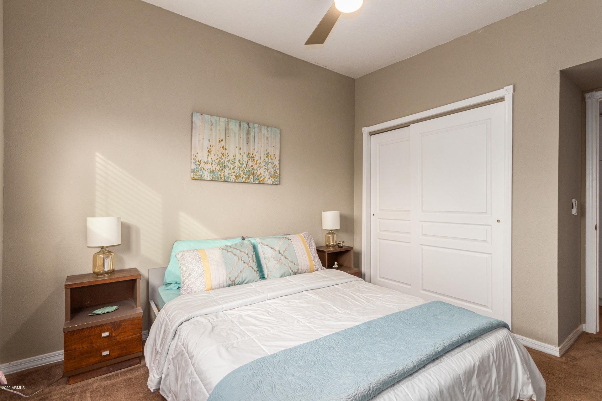 1732 North Queensbury Mesa, AZ 85201 - Photo 15 of 27 a bedroom with a bed and a night stand