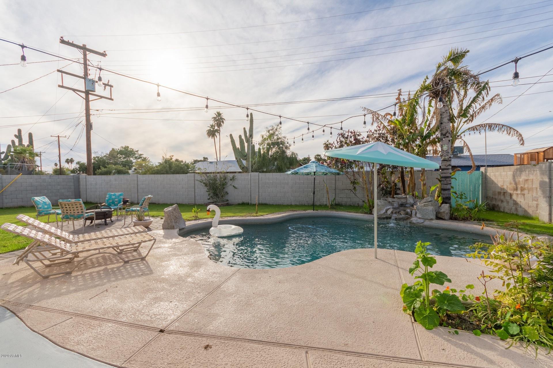 1732 North Queensbury Mesa, AZ 85201 - Photo 23 of 27 a view of a house with backyard and sitting area