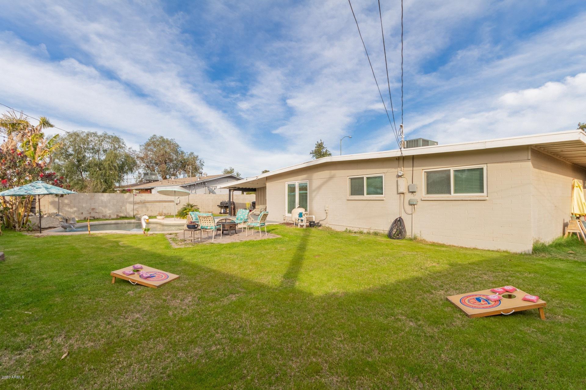 1732 North Queensbury Mesa, AZ 85201 - Photo 25 of 27 a view of a house with a yard