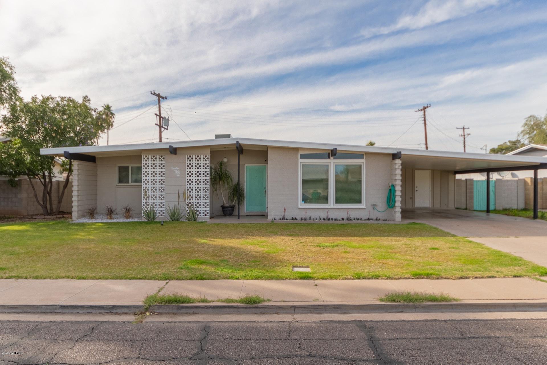 1732 North Queensbury Mesa, AZ 85201 - Photo 3 of 27 a view of a house with a swimming pool