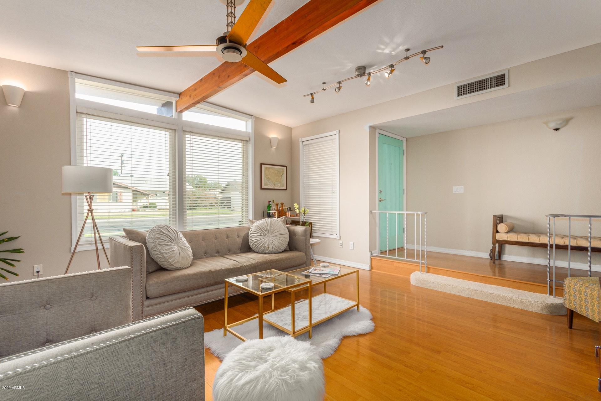 1732 North Queensbury Mesa, AZ 85201 - Photo 6 of 27 a living room with furniture and a table