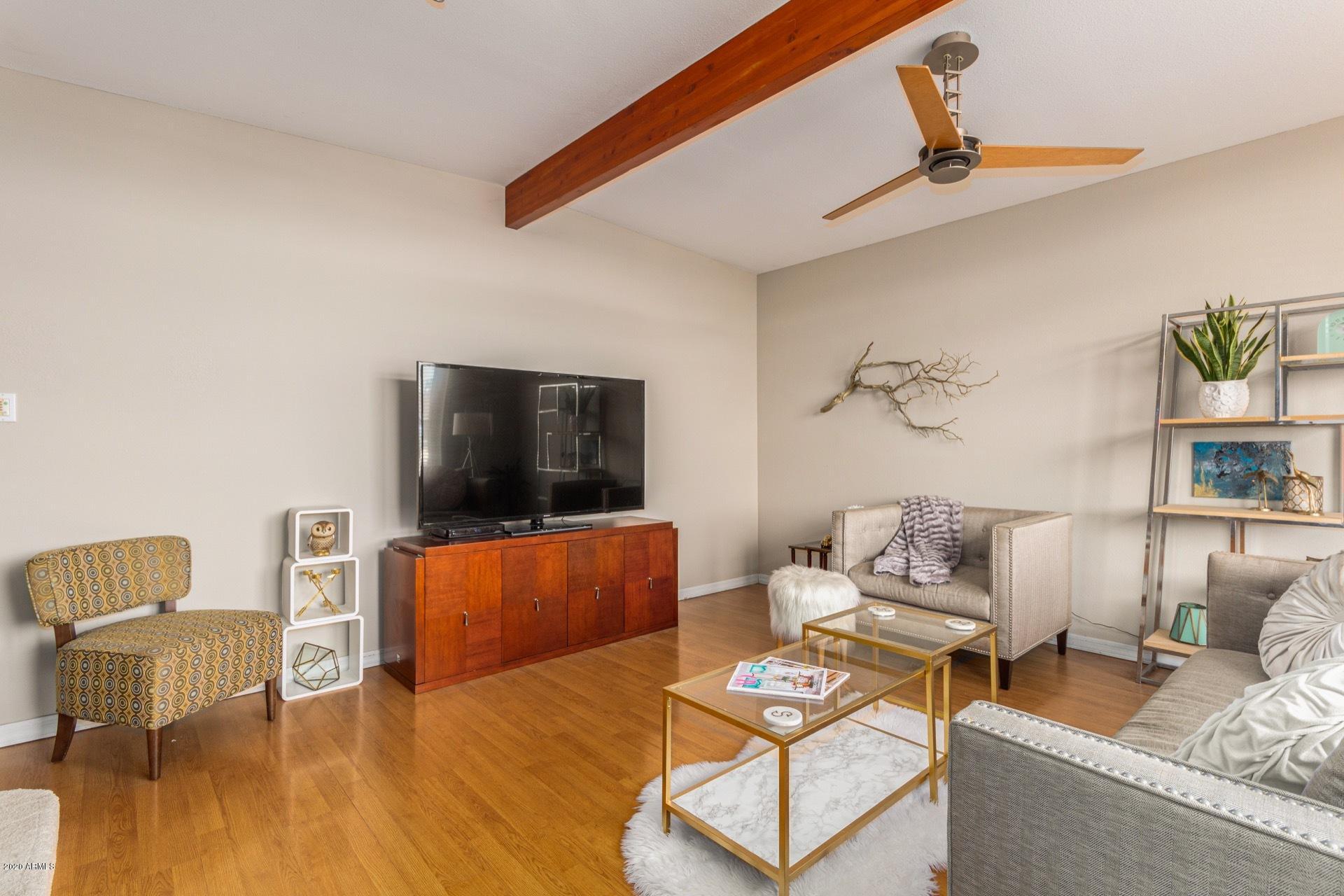 1732 North Queensbury Mesa, AZ 85201 - Photo 7 of 27 a living room with furniture and a flat screen tv