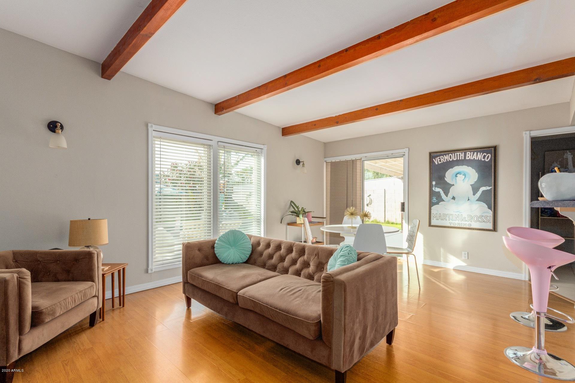 1732 North Queensbury Mesa, AZ 85201 - Photo 9 of 27 a living room with furniture and a large window